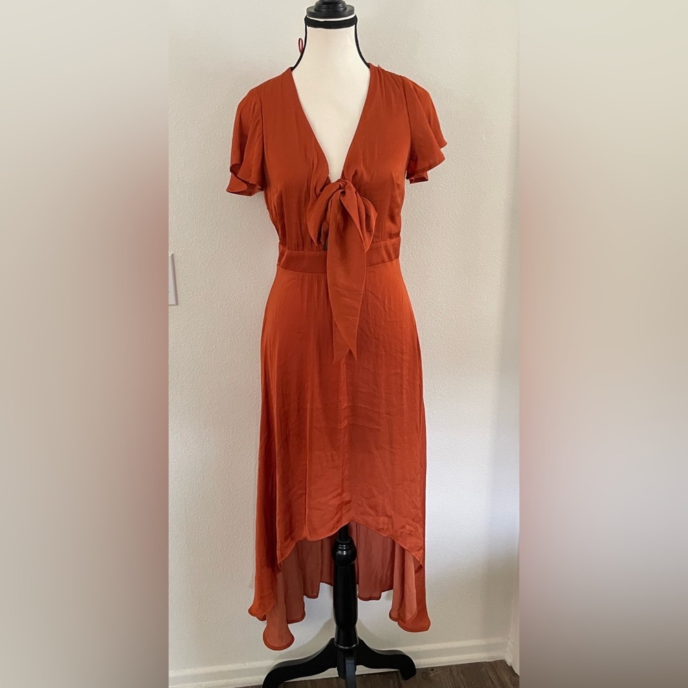 Francesca's rust-orange satin flutter sleeve high-low midi dress front tie knot